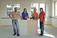 Das Projektteam von Variotherm mit Kundenberater Peter Unterrainer und den Monteuren der Firma Schwarz GmbH.